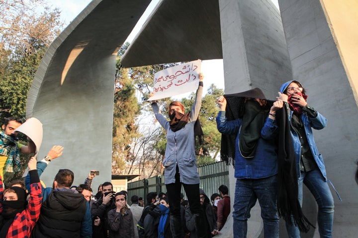 People gather to protest over high cost of living in Tehran, Iran on December 30, 2017. (Photo by Stringer/Anadolu Agency/Getty Images)