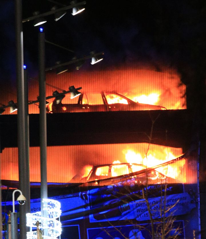 Vehicles burn during a blaze at a multi-storey car park at the Echo Arena on Liverpool's waterfront.