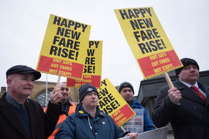 Campaigners protest at King's Cross station in London.