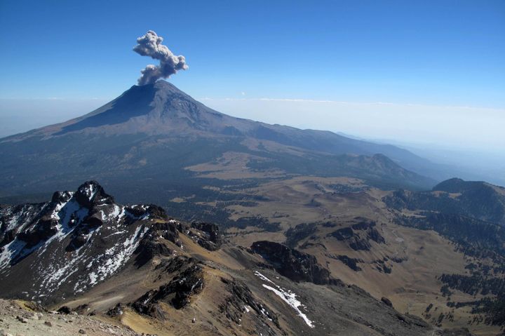 ctive Popocatepetl volcano in Mexico, one of the highest mountains in the country.