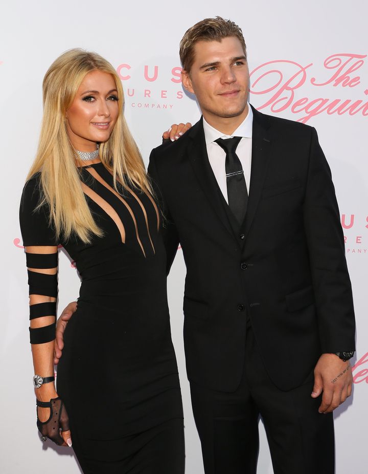 Paris Hilton and Chris Zylka at the premiere of