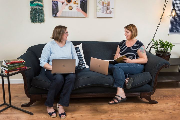 Gina Browning and Jill Sarmento, co-founders of Curious Nature Apothecary, work out of their office on Dell XPS laptops. 