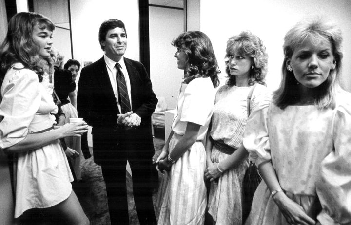 Potential models wait outside the office of Elite Model Management founder John Casablancas in 1983.