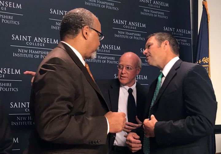 Former Ohio Secretary of State Ken Blackwell, left, New Hampshire Secretary of State Bill Gardner and Kansas Secretary of State Kris Kobach talk during a meeting of the Presidential Advisory Commission on Election Integrity.