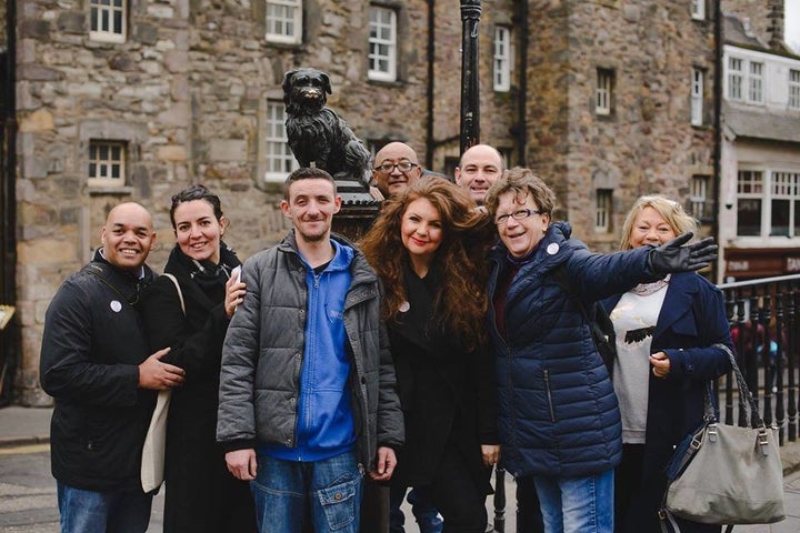 Zakia (pictured second from left) and one of the Invisible Edinburgh guides Sonny (third from left).