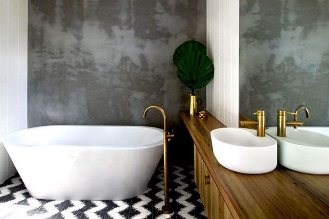 Bathroom with brass decor finishes
