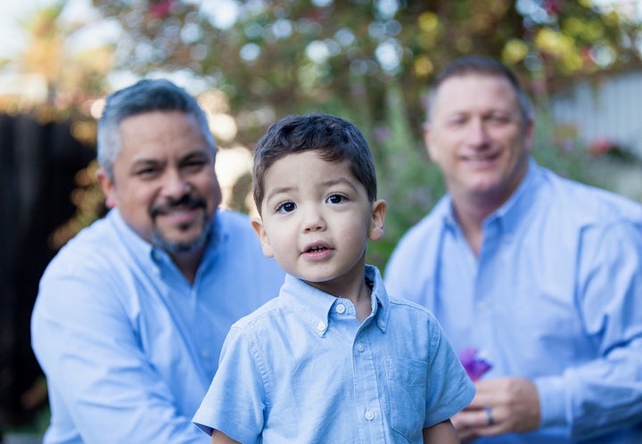 <em>RaiseAChild family, Richard & Jason Avila-Winburn and son.</em>