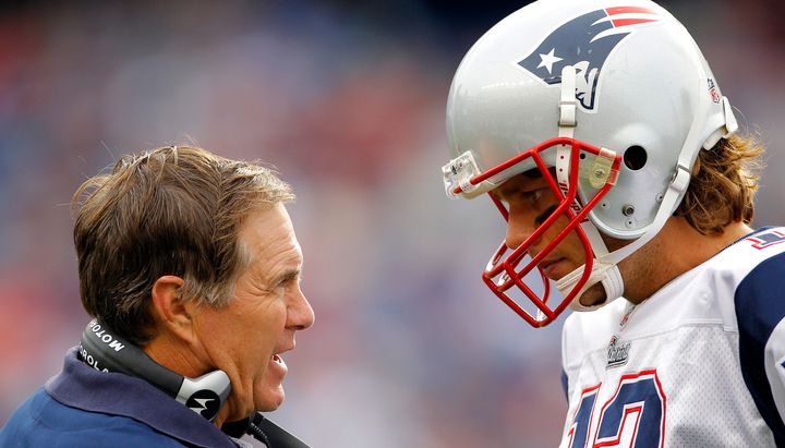 Bill Belichick talks with Tom Brady at the tail end of a game in Foxborough, Massachusetts, in 2010.