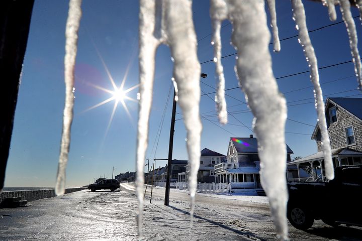 Icicles hang from a porch in Marshfield, Massachusetts on January 5, 2018. 