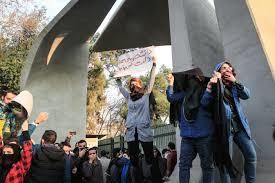 Taking a chance, with a sign held over head, to say once more, we are here and we count #IranianWomen