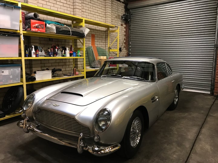 <p>1963 Aston Martin DB5 in the Supercar Advocates detailing bay</p>