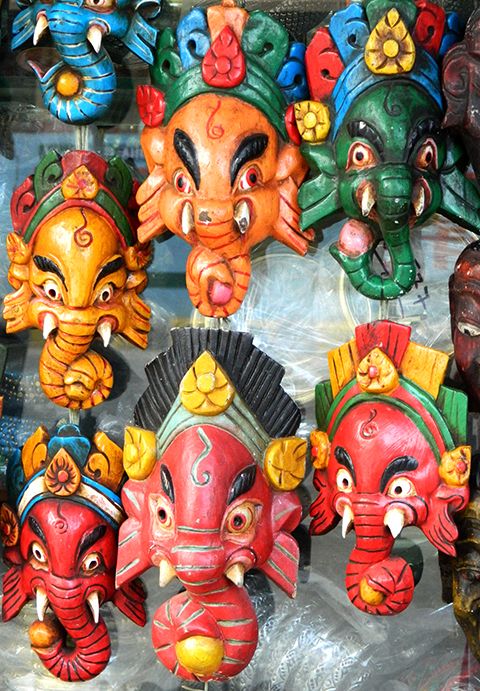 Versions of the Ganesha head in a popular tourist shopping district of New Delhi, India.