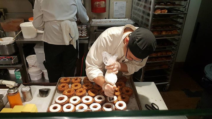 <p>Eggnog Cronuts being readied at Dominique Ansel Bakery</p>