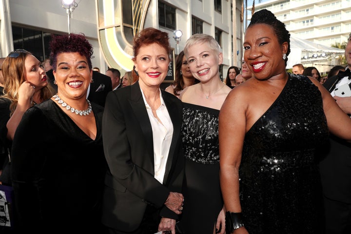 Actress Susan Sarandon brought activist Rosa Clemente as her guest on the red carpet. On the right, actress Michelle Williams