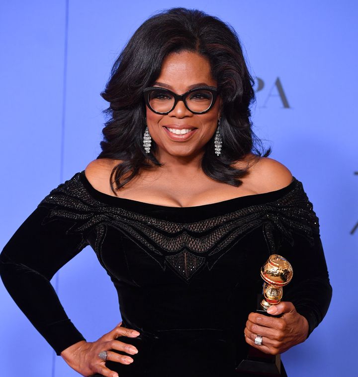 GEORGE PIMENTEL VIA GETTY IMAGES Oprah Winfrey poses with the Cecil B. DeMille Award at the 75th Annual Golden Globe Awards on Sunday.