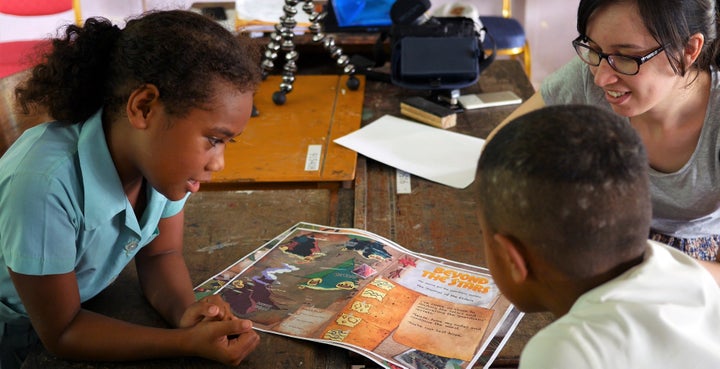 Students at a school in Fiji learning more about Beyond The Stars together with an S1T2 producer. SIT2 is an Australian creative technology agency specializing in experiential marketing, virtual reality, data visualization and augmented reality.