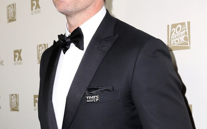There were lots of "Time's Up" pins at the Golden Globes, but few words from men about the movement.