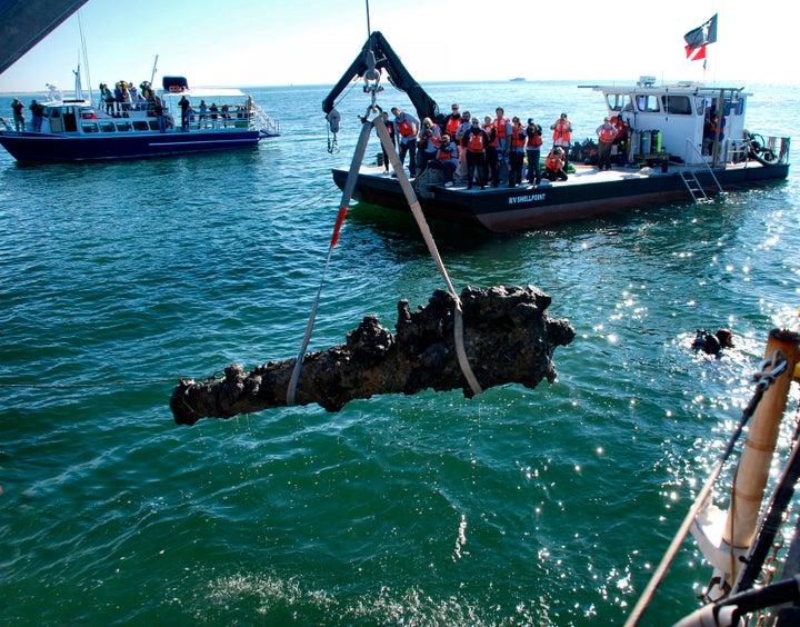 A cannon from Blackbeard's ship Queen Anne's Revenge is hoisted from the sea off the North Carolina shore in 2011.