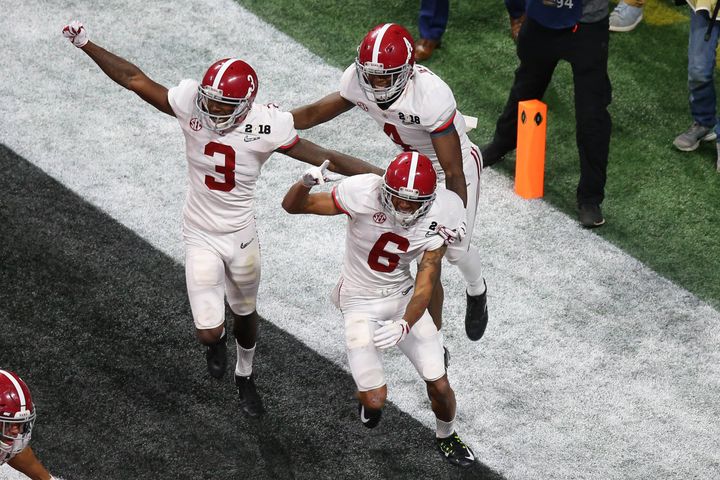 Alabama wide receiver DeVonta Smith celebrates his game-winning touchdown in overtime against the Georgia Bulldogs.