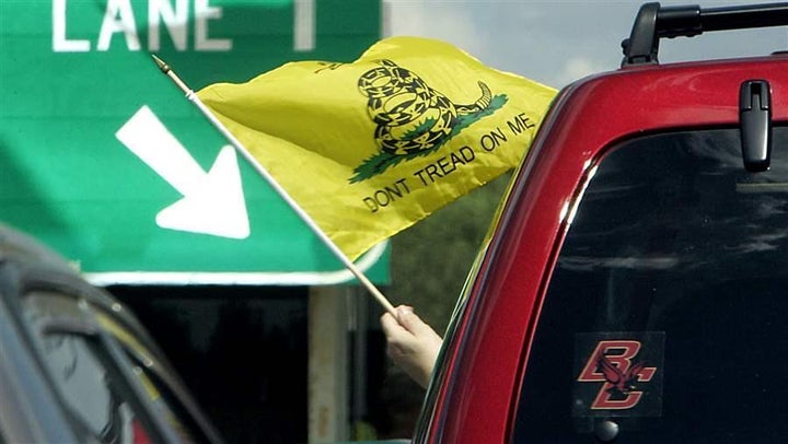 A driver protests a toll in Merrimack, New Hampshire.