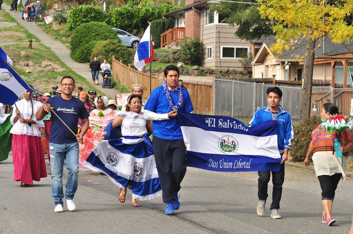 Salvadorans take part in a Salvadoran independence day parade in Seattle in 2015. With the latest move by the Trump administr