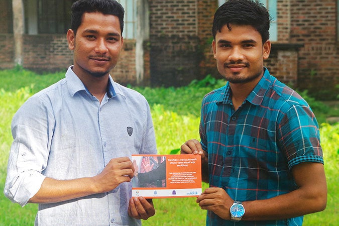 <p> Koyesh Miah (left) and a friend. </p>