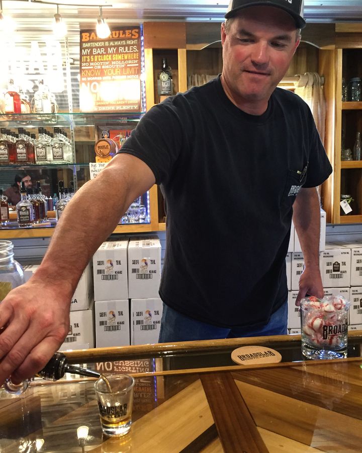 Jeremy Norris pours his Broadslab moonshine on tours, which is made the same way four generations of his family have made it — often at night under the moon to avoid paying taxes.