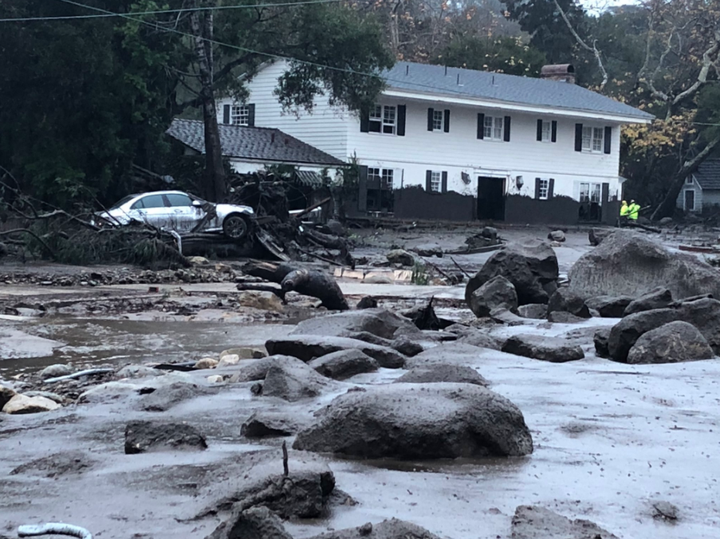 Rain triggered mud and boulders to crash into homes in Montecito, California.