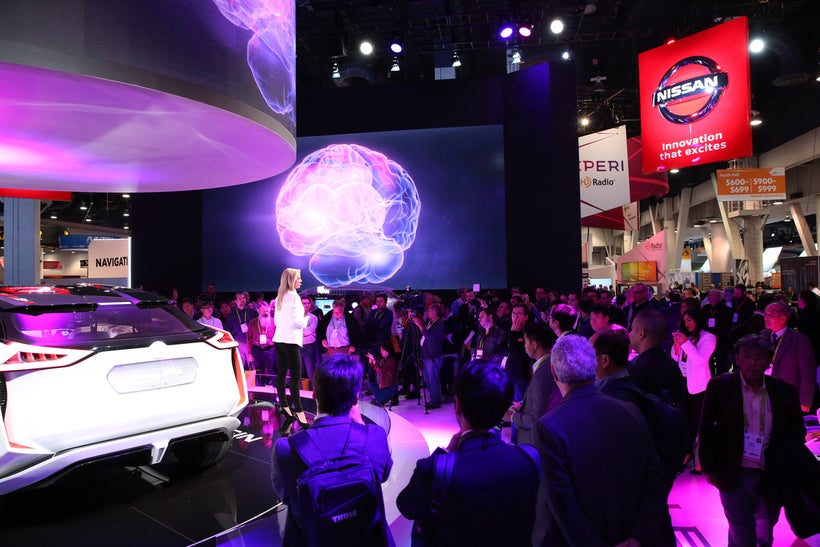 Nissan’s CES booth featured live demonstrations of “Brain to Vehicle” technology. The idea is to enhance the driving experien
