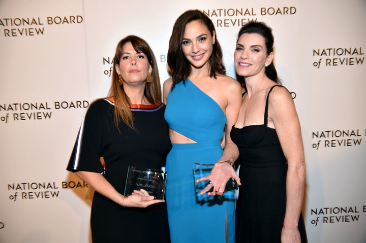 Patty Jenkins, left, who won a Spotlight Award, poses along with her "Wonder Woman" actress Gal Gadot and Julianna Margulies. Jenkins said Natalie Portman's comment during the Golden Globes made her laugh.