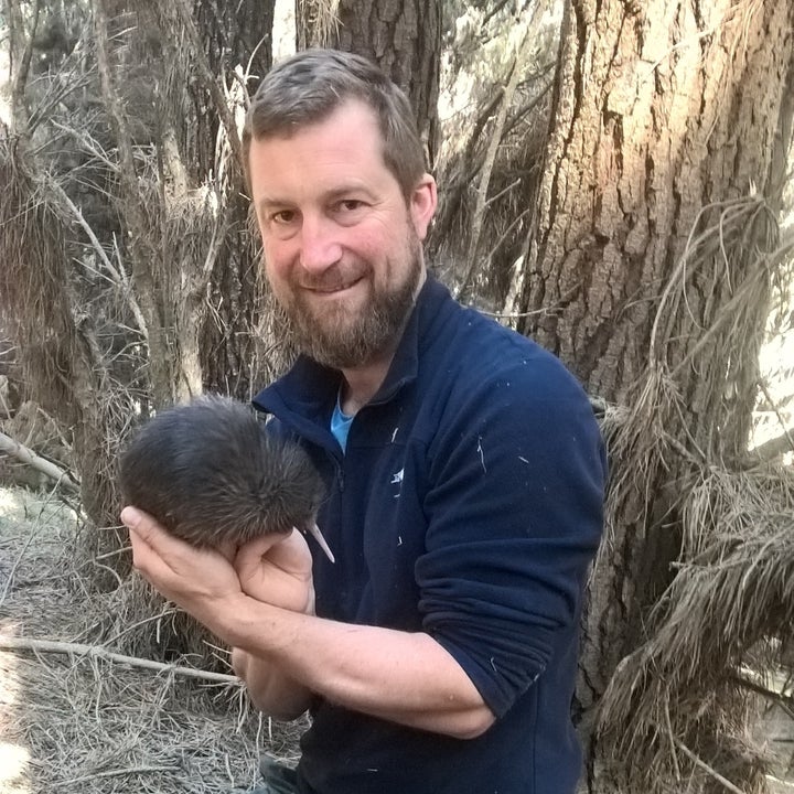 Beau Fahnle holds “Mr. Pitt”: “We actually want feisty birds that fight against us when we handle them. They’ll do better in the wild.”