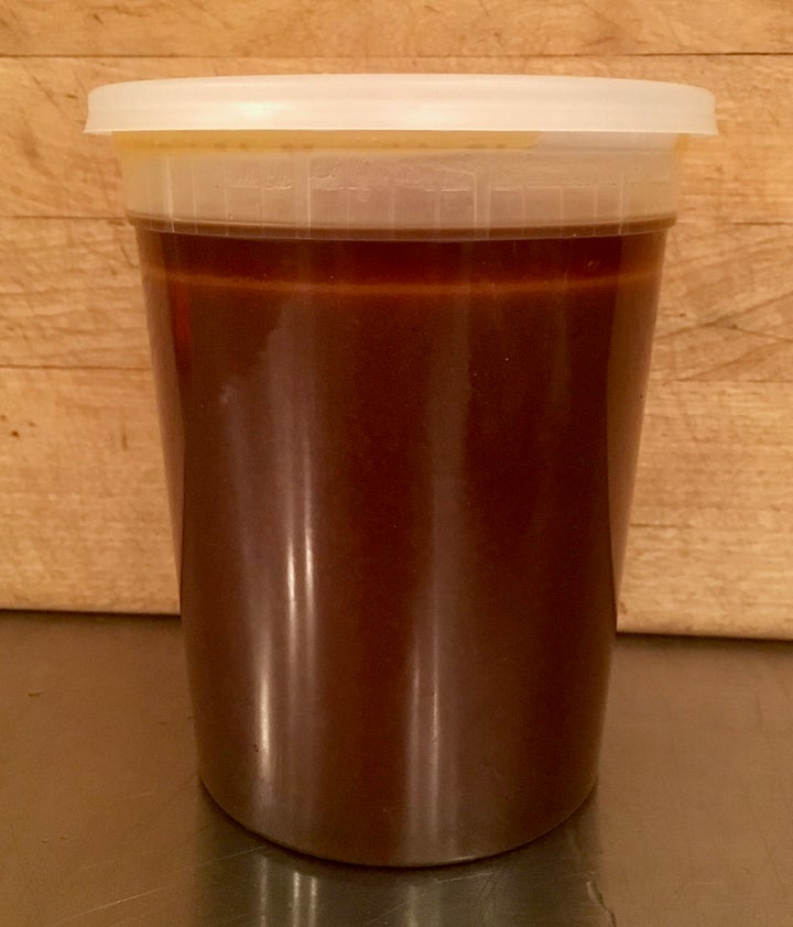 Almost a quart (liter) of sauce; the fat will congeal in the fridge and can then be removed in one piece