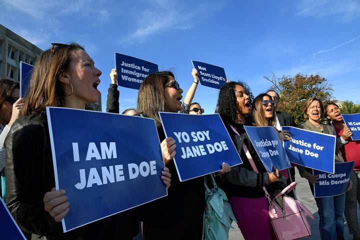 Protesters rally in support of "Jane Doe," an immigrant teenager who had to go to court to seek access to an abortion. Since her case began, three other immigrant teens have done the same.