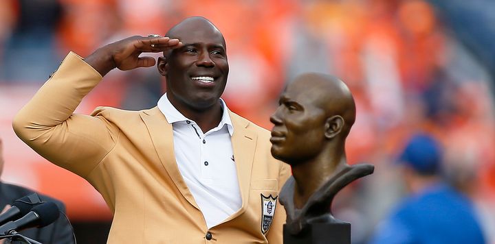 Terrell Davis gives Broncos fans a "Mile High salute" after being honored with his Hall of Fame induction before the Nov. 17 game in Denver.