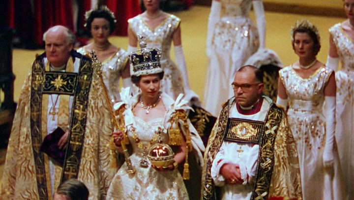 The Queen with her Maids of Honour and the Archbishop of Canterbury during the coronation