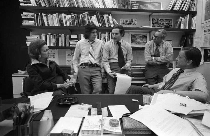 Washington Post publisher Katharine Graham with reporters Carl Bernstein, Bob Woodward, editor Howard Simons discuss the Wate