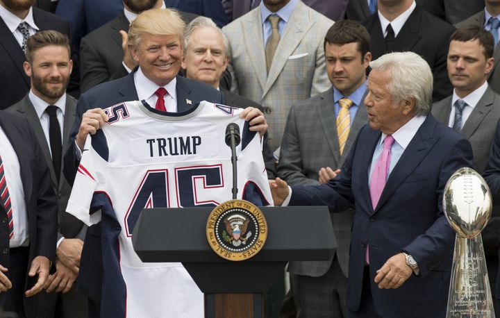 President Donald Trump is friendly with NFL owners like the New England Patriots' Robert Kraft (right).
