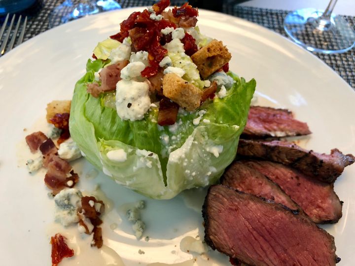Steak and wedge salad at Classified
