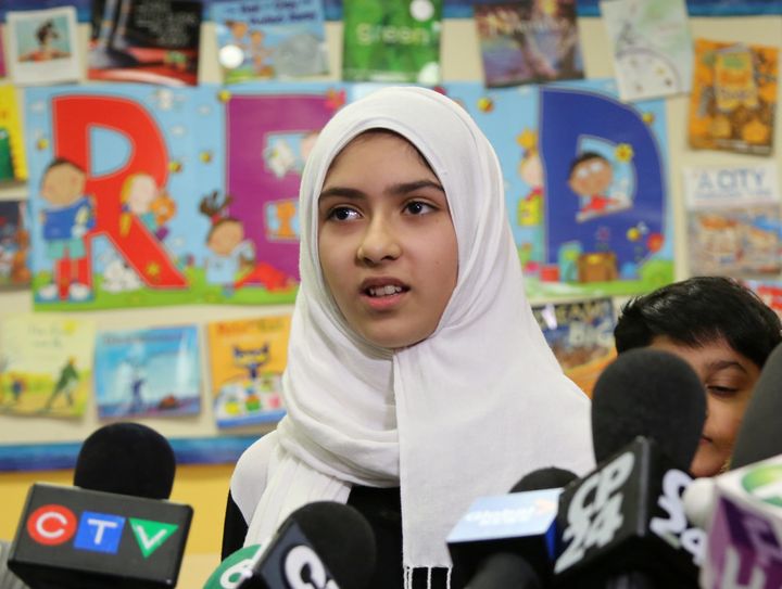 Khawlah Noman, 11, speaks to reporters at Pauline Johnson Junior Public School, after she told police that a man cut her hijab with scissors in Toronto, Ontario, Canada January 12, 2018.