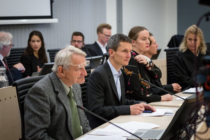 Ketil Lund former Supreme Court judge representing Grandparents Against Climate Change Truls Gulowsen head of Greenpeace Norway Ingrid Skjoldvaer head of Nature and Youth (left-right).