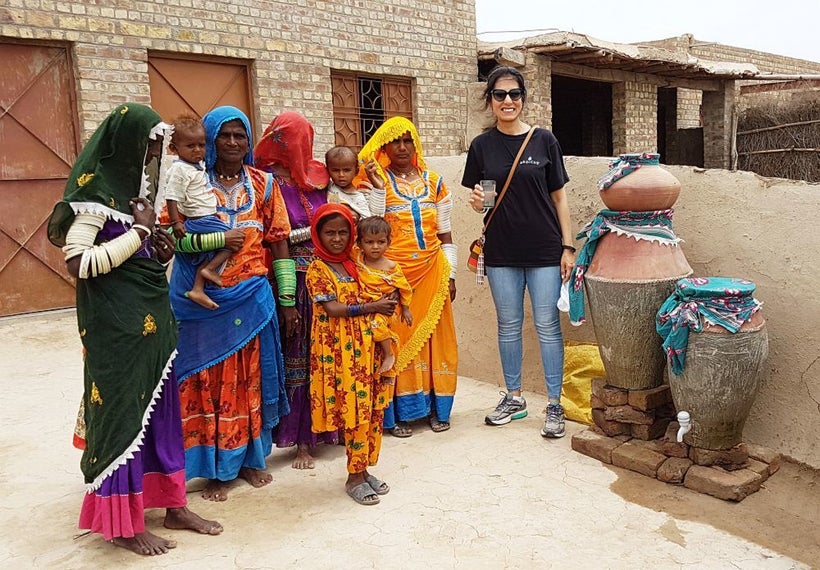 <em>Mehreen with some recipients of her safe water project in the Thar Desert region in Sindh, Pakistan.</em>