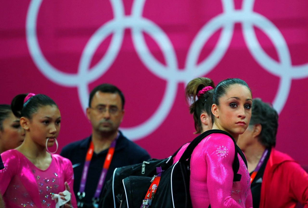 Larry Nassar and members of the U.S. national gymnastics team prepare the day before the London 2012 Olympic Games began.