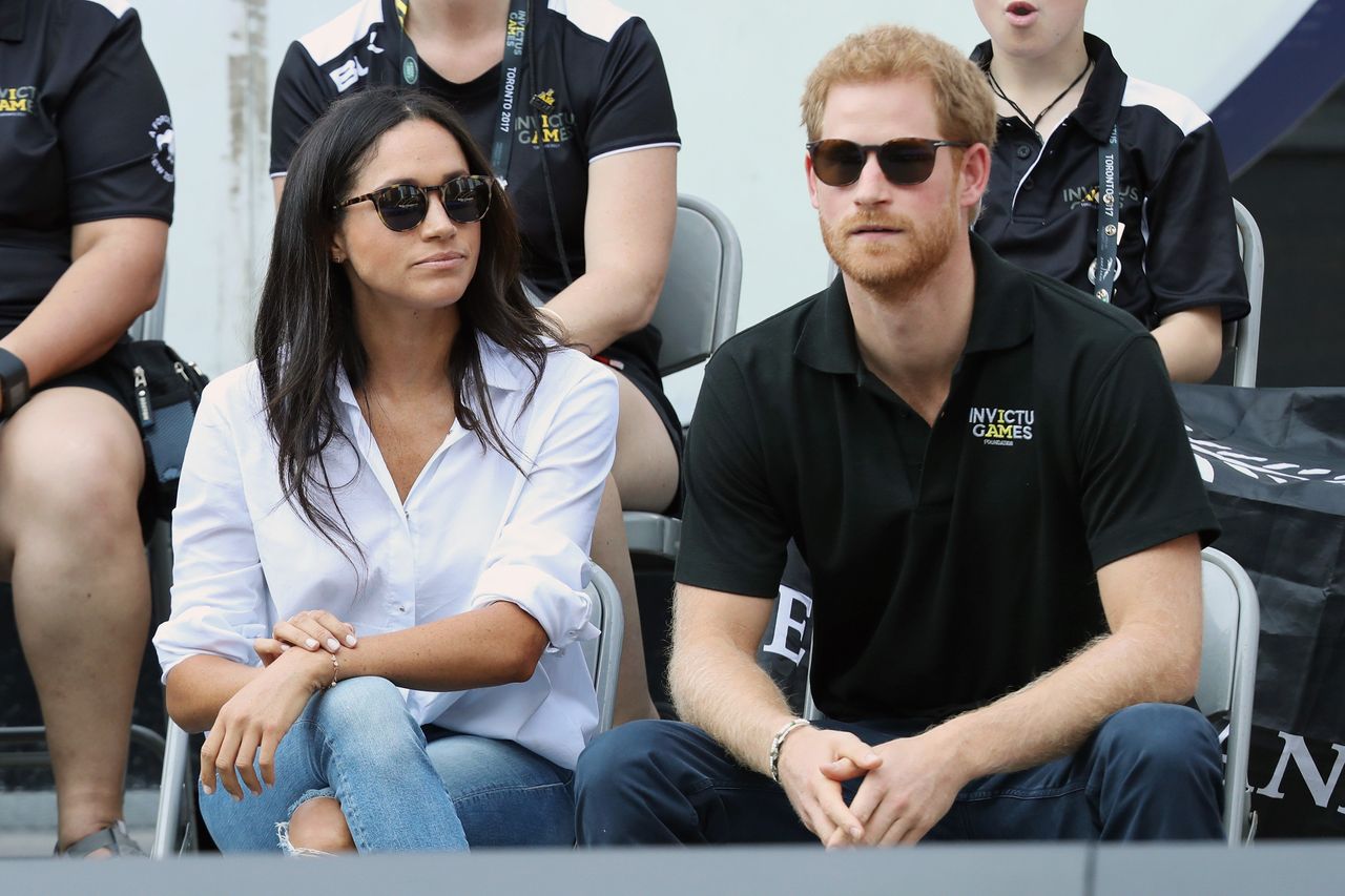 'The beginning of a new era': The first official engagement Prince Harry attended with Meghan Markle - the Invictus Games in September 2017.