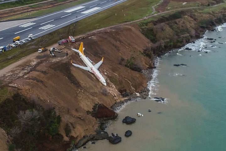 A Pegasus Airlines Boeing 737 passenger plane was stuck in mud on an embankment after landing at Trabzon's aiport on the Blac