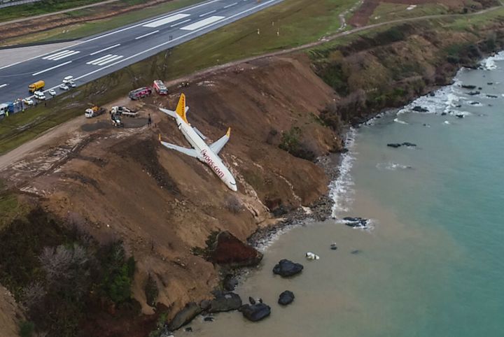 A Pegasus Airlines Boeing 737 passenger plane was stuck in mud on an embankment after landing at Trabzon's aiport on the Black Sea coast on Sunday.