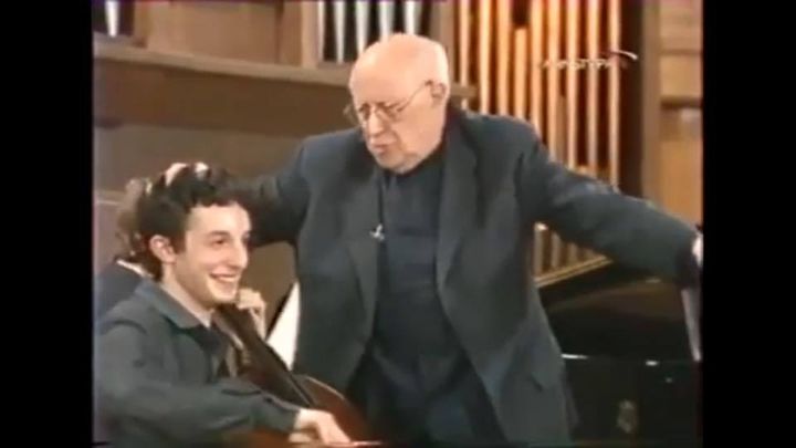 <p>Evgeny Tonkha gets a noogie from Mstislav Rostropovich</p>
