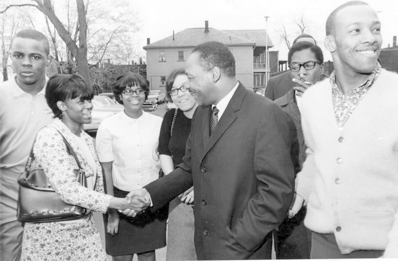 Dr. Martin Luther King, Jr., shaking hands with Glenville students, April 1067
