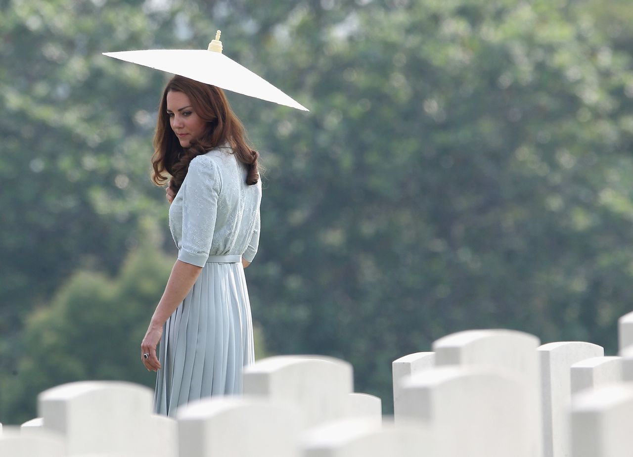 Jackson captures the Duchess of Cambridge glancing back at war graves at the Kranji Commonwealth War Cemetery in Singapore.
