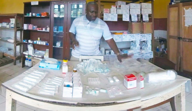 All the items spread out on this table are required to treat a single patient for the advanced form of sleeping sickness. This complex treatment is effective yet impractical, given that most patients live in rural Congo, far from hospitals and health workers.