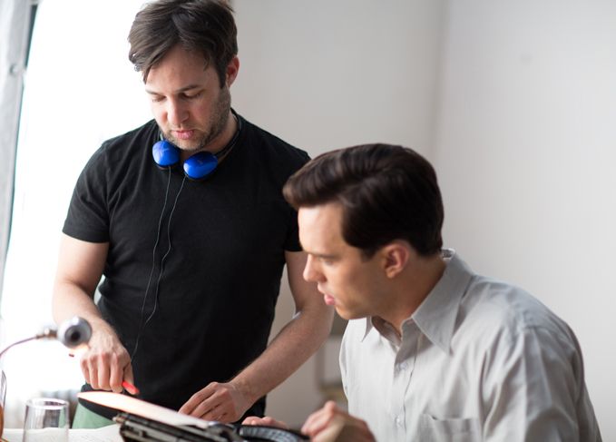 <p><strong>Writer/director Danny Strong on the set with star Nicholas Hoult</strong></p>
